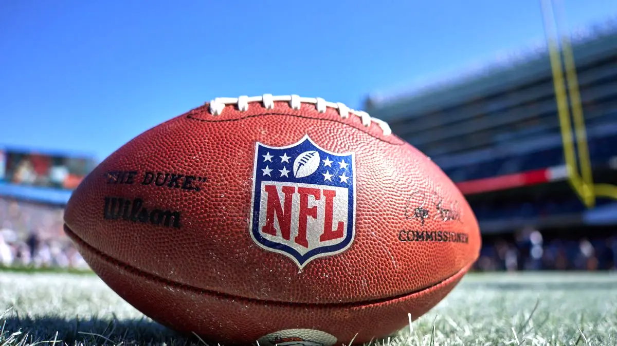 Men’s Blue Leather Jacket and Brown Backpack